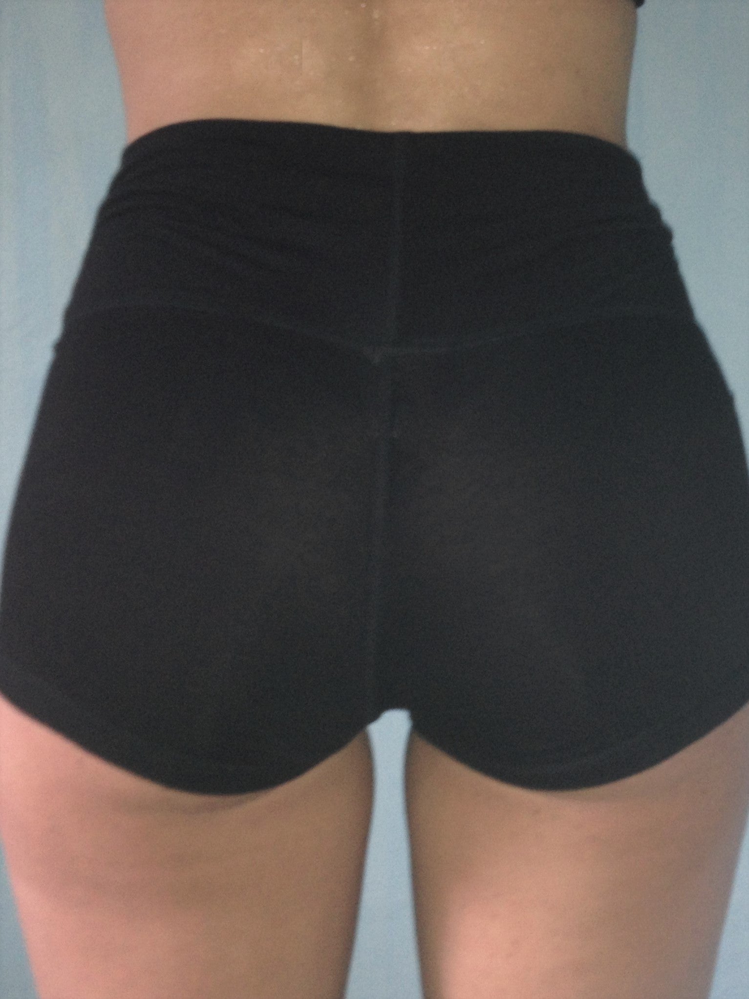 Solid black, soft yoga shorts with fold over waist, can be worn higher waisted, or low on the hips. Classic staple for your wardrobe. 90% cotton 20% spandex.