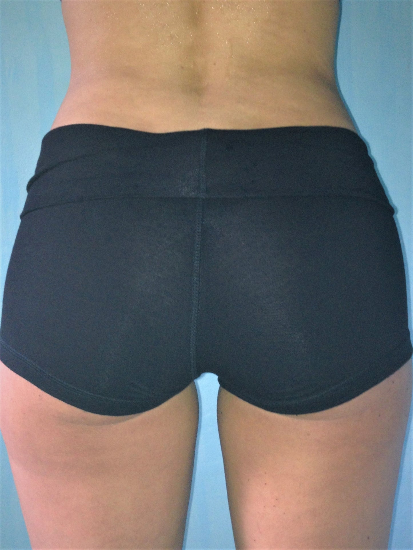 Solid black, soft yoga shorts with fold over waist, can be worn higher waisted, or low on the hips. Classic staple for your wardrobe. 90% cotton 10% spandex.