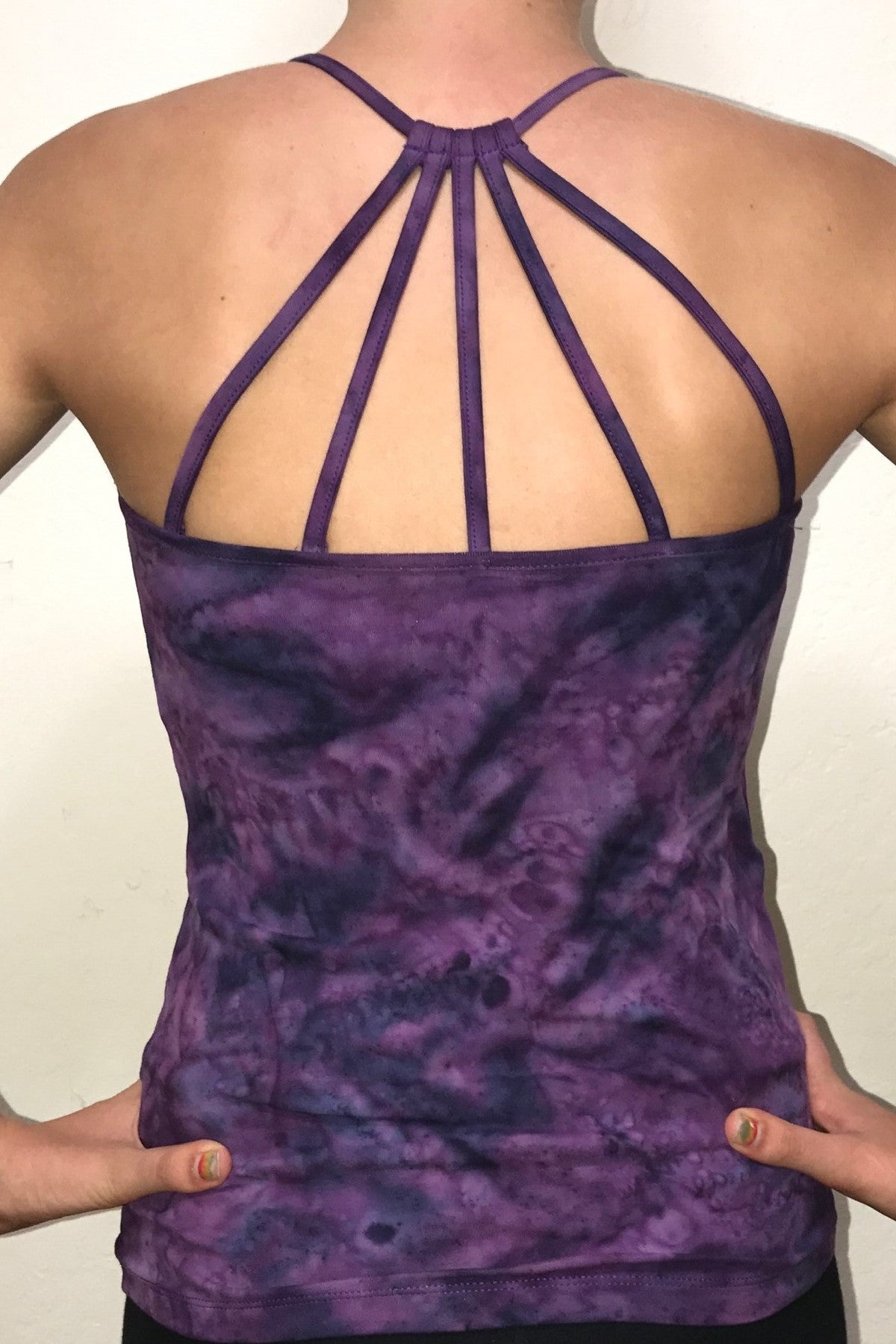 Back view Purple Haze Tie Dye Shanti Tank Top by Lotus Tribe Clothing with built in bra and stunning back strap design. Cute enough for everyday wear, but functional enough for yoga class or the gym. Super soft, high quality, 90% cotton knit with 10% spandex for just enough stretch. 