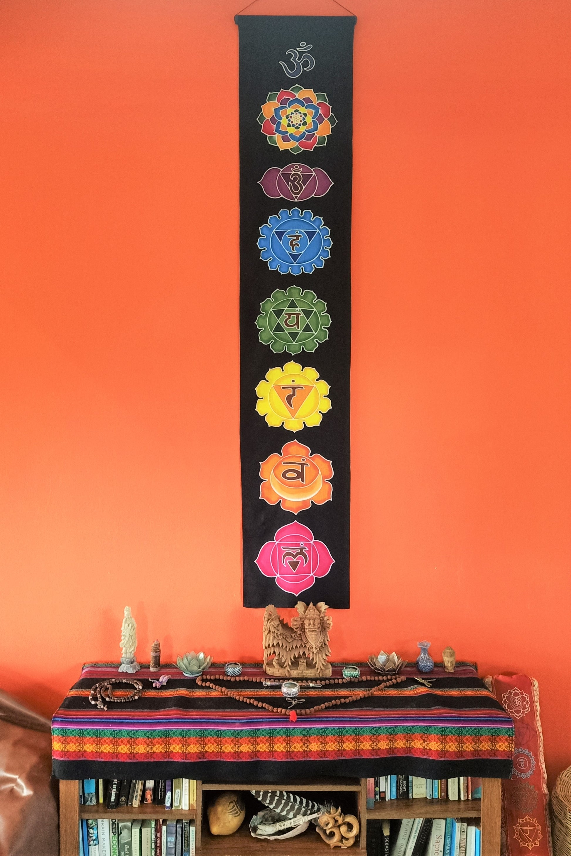 Chakra Banner with black background and 7 chakras in thier rainbow of colors. Made with batik wax and dye process by hand on rayon fabric. 