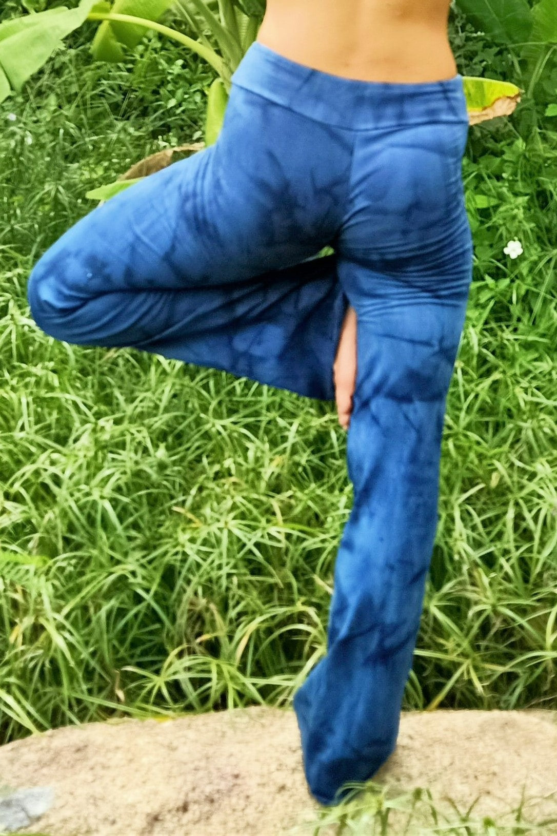 Blue krinkle tie dye Yoga Pants with flared leg and flat waist made of 90% organic cotton with 10% spandex. 