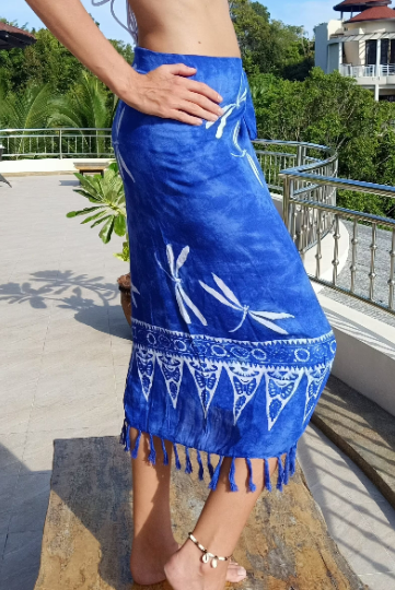 Wrap around sarong skirt. Blue with white dragonfly pattern. Hand batik process.