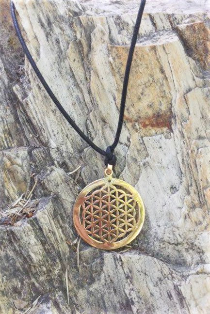 Brass Flower of Life Sacred Geometry pendent 3.5 cm (almost 1.5") in diameter, comes on black waxed cotton cord (vegan friendly).