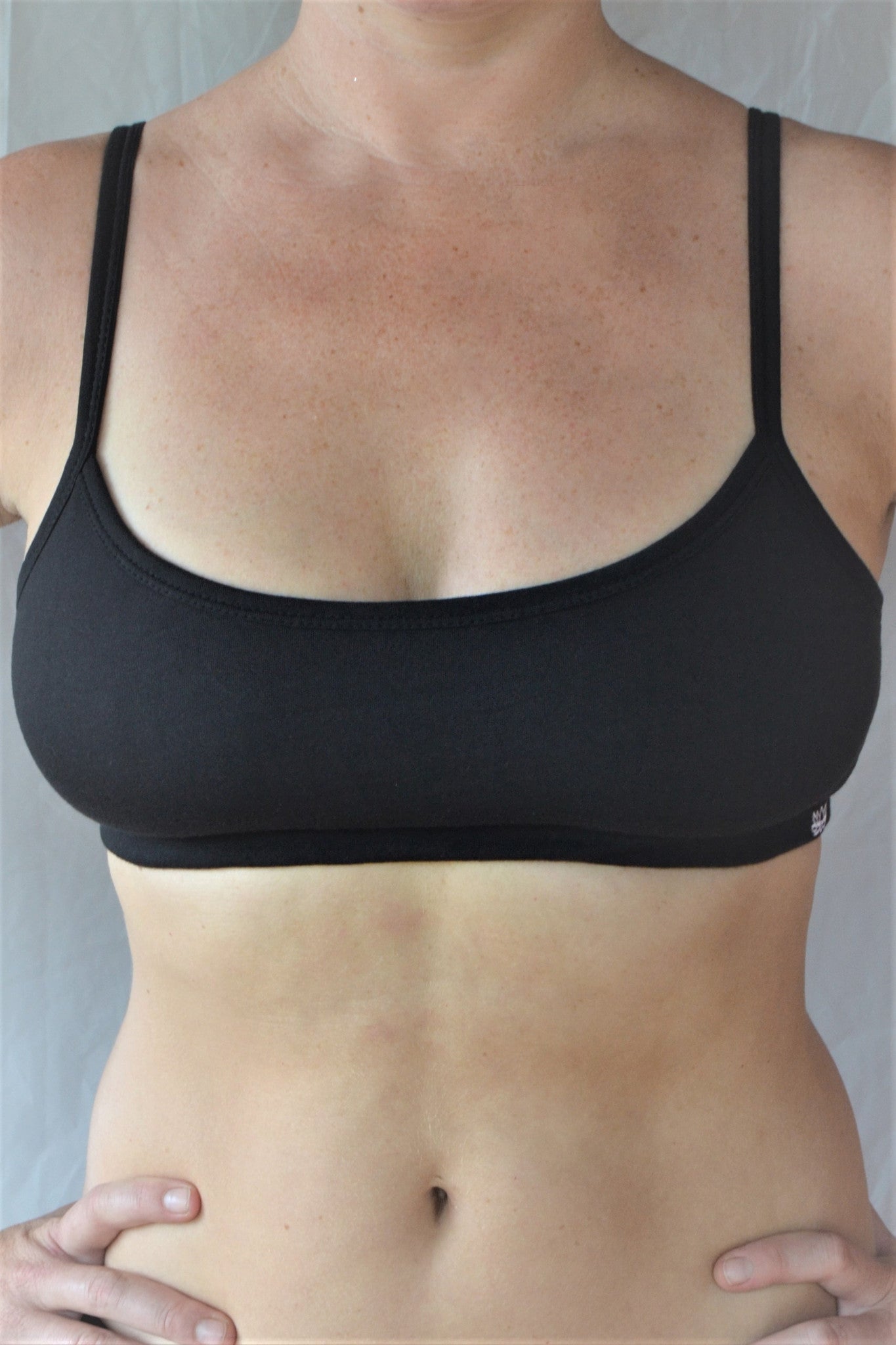 Enjoy a perfect state of zen in our basic, minimalist sportsbra. Solid black. Medium support, great for an active lifestyle with adjustable spaghetti straps.