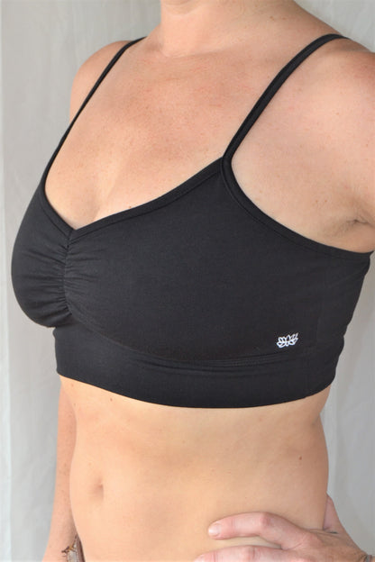 You'll be blissed out in this flattering Onyx (black) bra with adjustable spaghetti straps and scrunched center puckering it will soon become your new favorite!