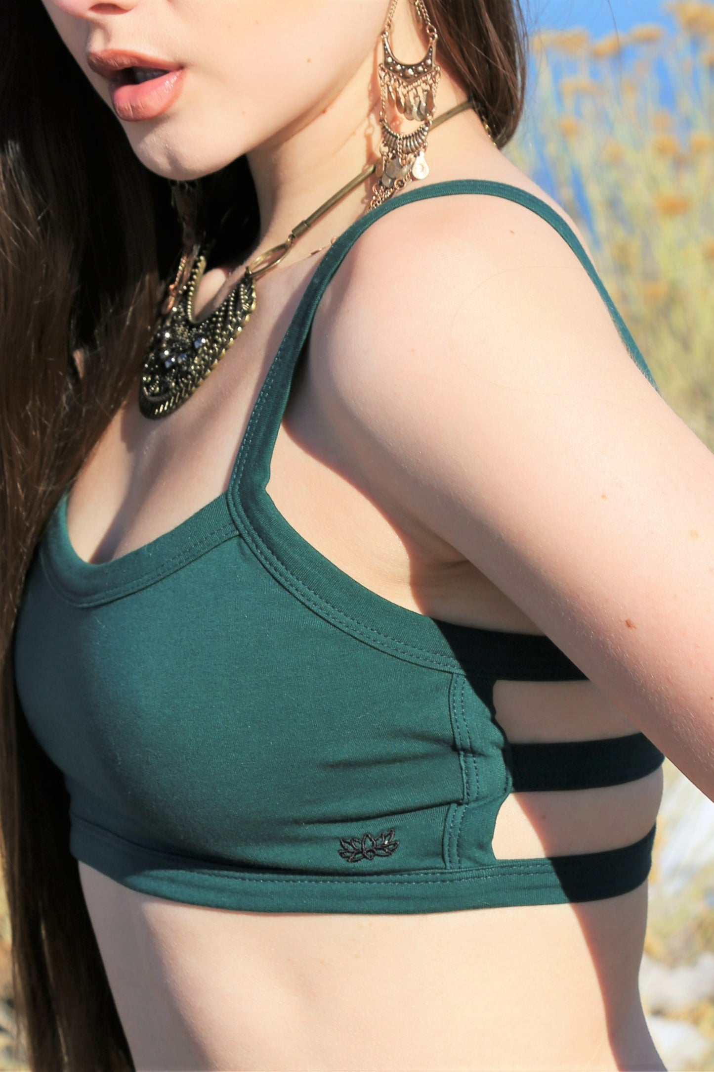 Side view of Forest Trinity Bra shows 3 hortizontal back straps and small lotus flower embroidery detail. 