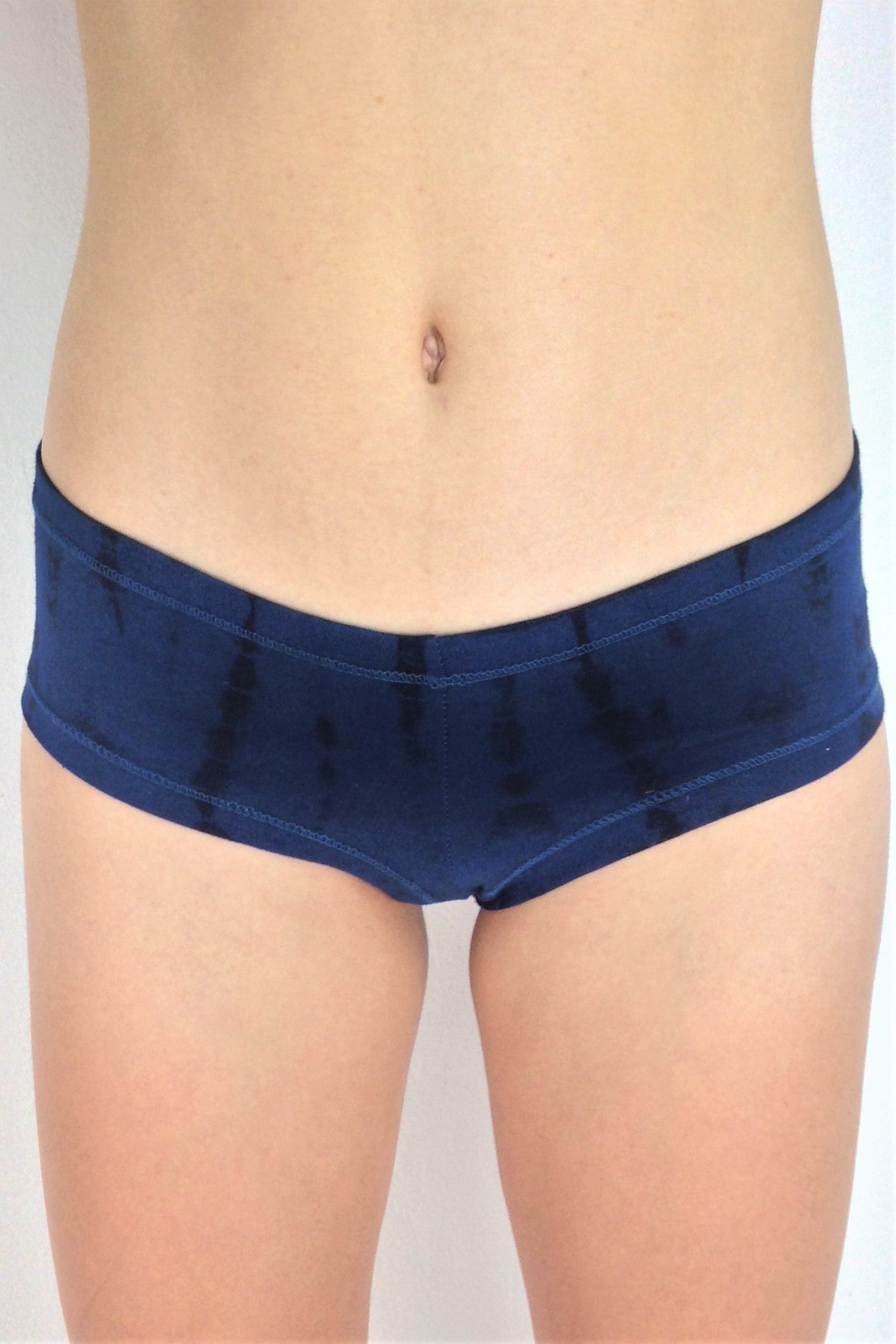 Front view of Midnight Tie Dye Cheeky Undies, dark blue tie dye with black highlights 90% cotton 10% spandex